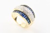 A SAPPHIRE AND DIAMOND DOME RING - 2