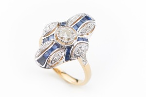 A SAPPHIRE AND DIAMOND RING