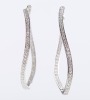 A PAIR OF DIAMOND HOOP EARRINGS