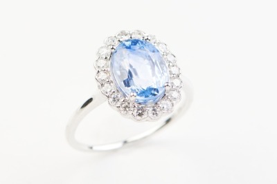 A SAPPHIRE AND DIAMOND RING