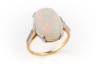 A VINTAGE OPAL AND DIAMOND RING