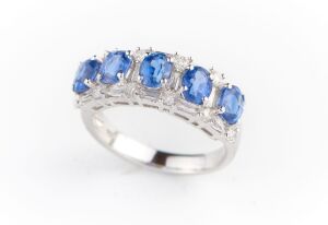 A FIVE STONE KYANITE AND DIAMOND DRESS RING