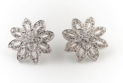 A PAIR OF DIAMOND EARRINGS