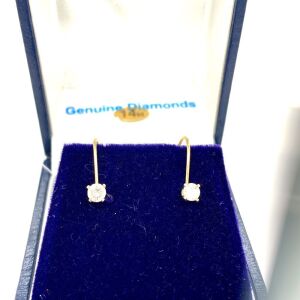 A PAIR OF DIAMOND EARRINGS