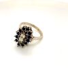 A SAPPHIRE AND DIAMOND CLUSTER RING - 4