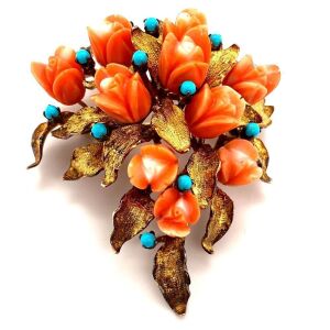 A MID CENTURY CORAL AND TURQUOISE BROOCH