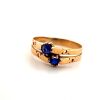 A SAPPHIRE CROSSOVER RING