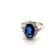 A SAPPHIRE AND DIAMOND CLUSTER RING - 2