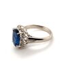 A SAPPHIRE AND DIAMOND CLUSTER RING - 4