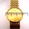 AN ETENA GOLD WRISTWATCH - 5