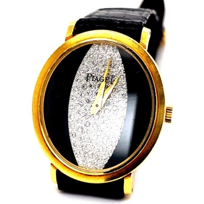 A LADIES PIAGET GOLD AND DIAMOND WRISTWATCH