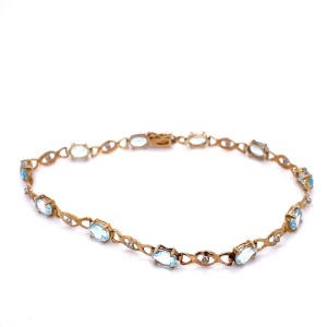 A TOPAZ AND DIAMOND BRACELET