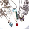 FOUR PENDANT NECKLACES INCLUDING GEM SET