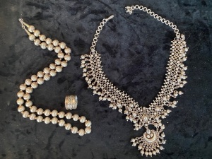 TWO SILVER NECKLACES AND A DESIGNER DRESS RING