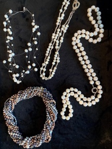 FOUR STRANDS OF FRESHWATER PEARLS