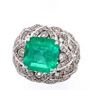 A COLUMBIAN EMERALD AND DIAMOND RING