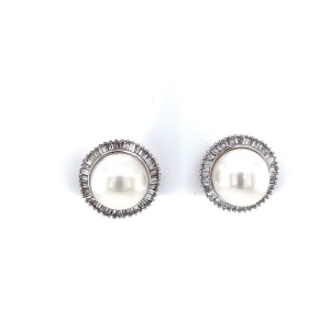 A PAIR OF PEARL AND DIAMOND CLUSTER EARRINGS