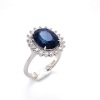 A SAPPHIRE AND DIAMOND RING