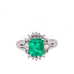 AN EMERALD AND DIAMOND RING