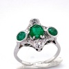 A THREE STONE EMERALD AND DIAMOND RING - 6