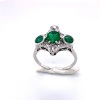 A THREE STONE EMERALD AND DIAMOND RING - 3