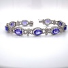 A TANZANITE AND DIAMOND BRACELET - 6