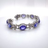 A TANZANITE AND DIAMOND BRACELET - 3