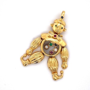 AN EMERALD, DIAMOND, RUBY AND SAPPHIRE CLOWN PENDANT