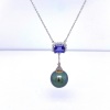 A TANZANITE, TAHITIAN PEARL AND DIAMOND PENDANT