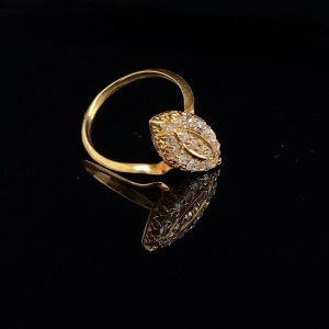 A MARQUISE SHAPED DIAMOND DRESS RING