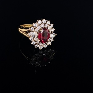 A SYNTHETIC RUBY AND CZ SET DRESS RING