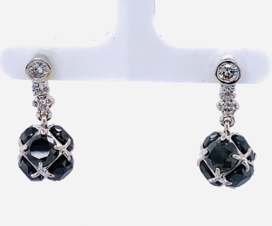 A PAIR OF BLACK DIAMOND EARRINGS