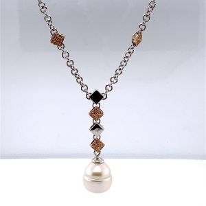 A SOUTH SEA PEARL AND PINK DIAMOND NECKLACE BY ANTON