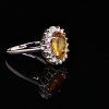 A YELLOW SAPPHIRE RING - 3
