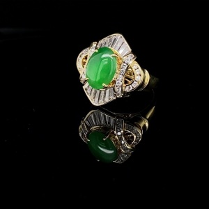 A JADEITE AND DIAMOND DRESS RING