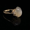A MOONSTONE AND DIAMOND RING - 2