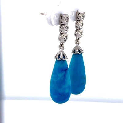 A PAIR OF HOWLITE AND DIAMOND DROP EARRINGS