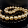 A GRADUATED STRAND OF GOLDEN SOUTH SEA PEARLS - 3
