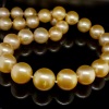 A GRADUATED STRAND OF GOLDEN SOUTH SEA PEARLS - 4