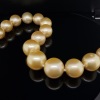 A GRADUATED STRAND OF GOLDEN SOUTH SEA PEARLS - 5
