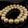 A GRADUATED STRAND OF GOLDEN SOUTH SEA PEARLS - 7