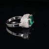 AN EMERALD AND DIAMOND RING - 4