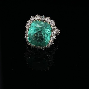 A SUPERB COLOMBIAN EMERALD AND DIAMOND RING