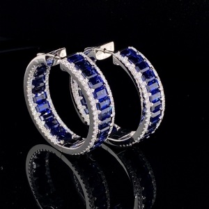 AN IMPRESSIVE PAIR OF SAPPHIRE AND DIAMOND EARRINGS