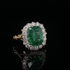 A COLOMBIAN EMERALD AND DIAMOND RING