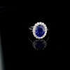 A SAPPHIRE AND DIAMOND CLUSTER RING - 4