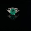 A COLOMBIAN EMERALD AND DIAMOND RING