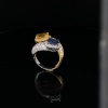 A DIAMOND AND SAPPHIRE CROSSOVER RING - 5
