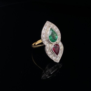 AN EMERALD, RUBY AND DIAMOND RING