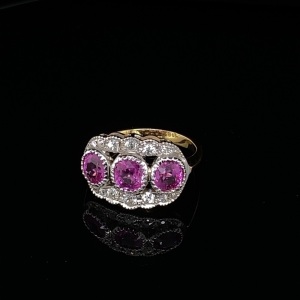 A PINK SAPPHIRE AND DIAMOND DRESS RING